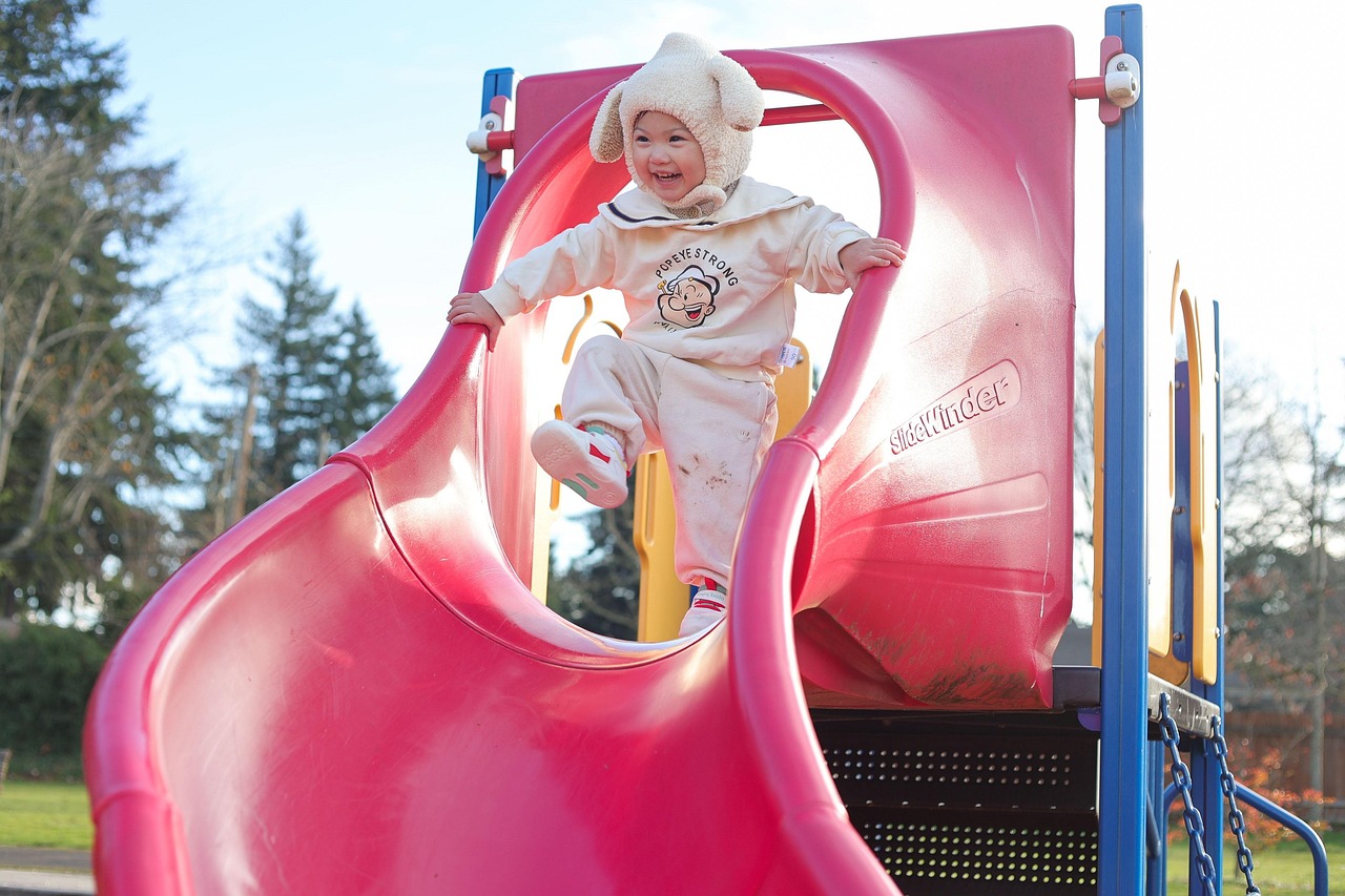 slide, baby, girl, playing, child, kid, little girl, happy, playground, bunny outfit, fun, childhood